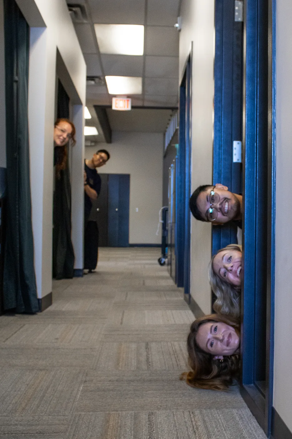River Heights Physiotherapy team in the clinic hallway